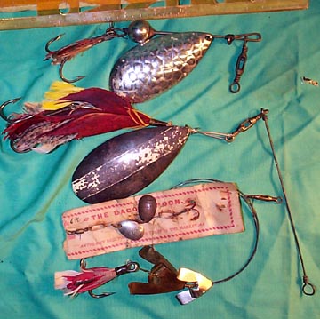 Assortment of vintage trout fishing lures with feathered tails treble hook  weigh